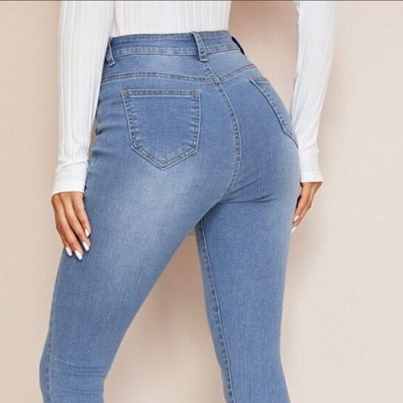 CLEARANCE. Abela Story and Co. mid wash ripped BF jeans w/ zipper - plus sizes - Picture 1 of 3